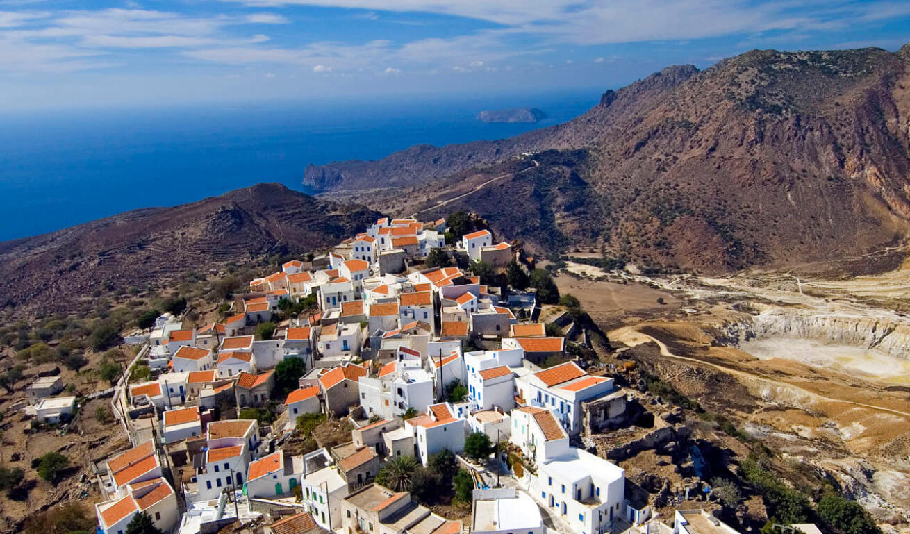 Traditional settlement next to a volcanic crater near the sea.