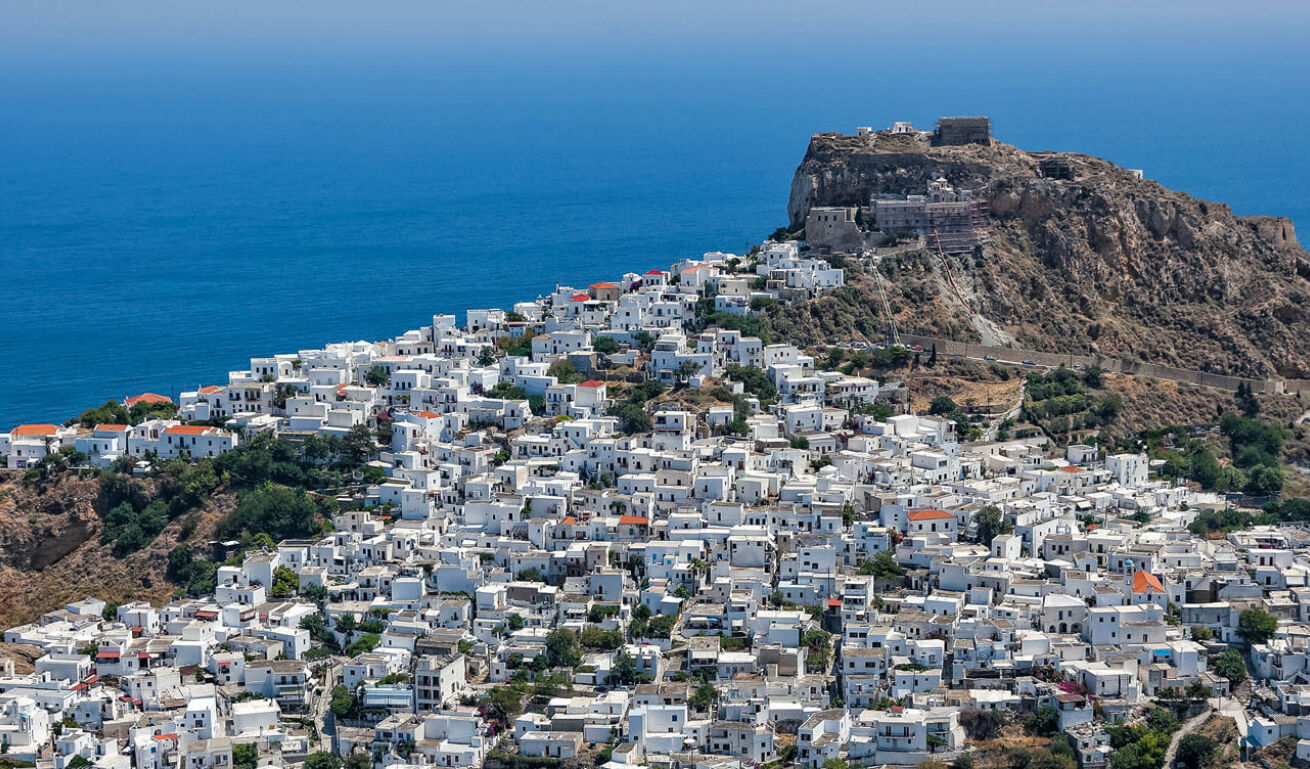 Panoramic view of the island, with the numerous whitewashed houses overlooking at the sea