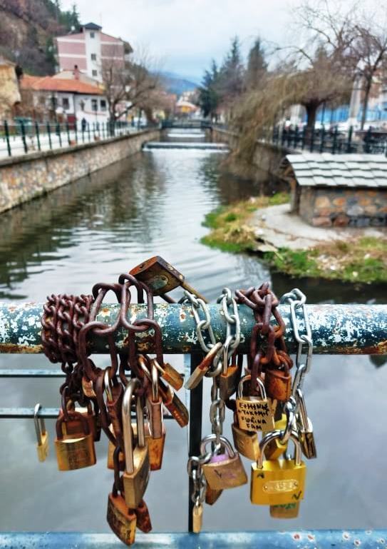 Locks and chains on a bridge