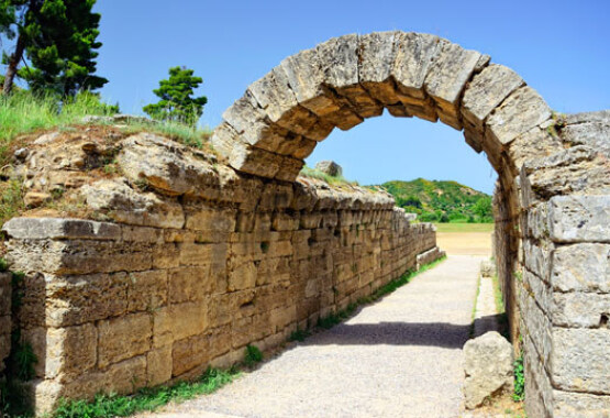 Ancient arch leading to an ancient stadium.