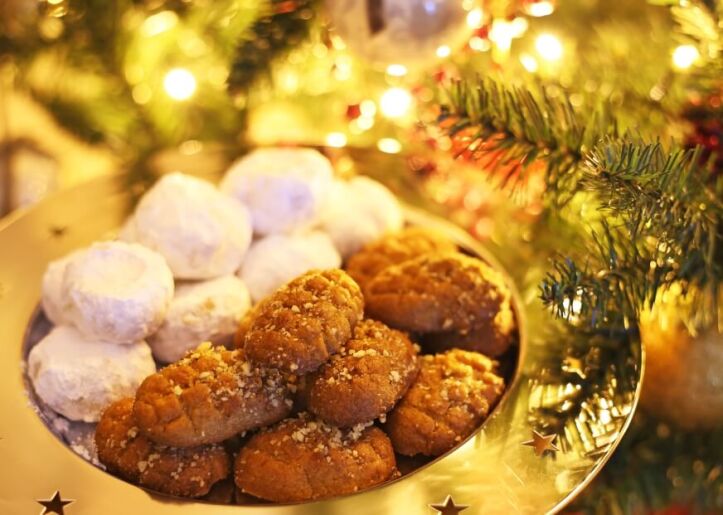 A dish with Greek cookies called Melomakarona and Kourabiedes
