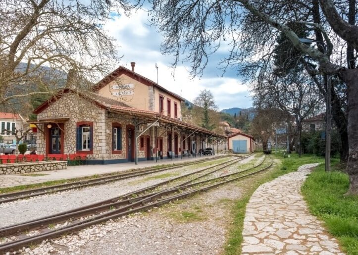 Train station in Kalavryta and backdrop of the stone built structrure.