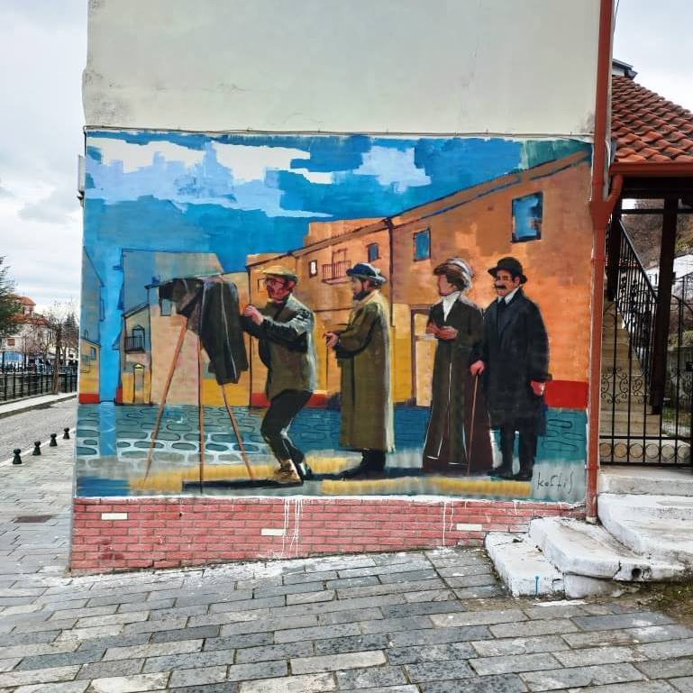 a colourful mural with people