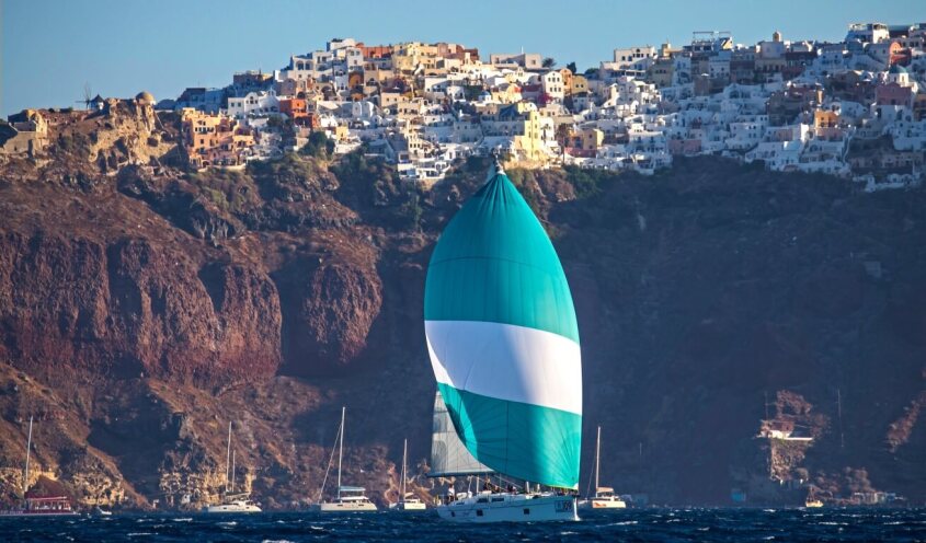 Sailing boats in front of Santorini island