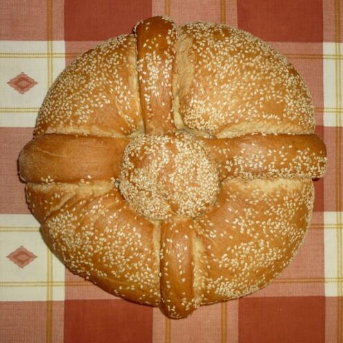 A table with a typical christmas bread made in Greece