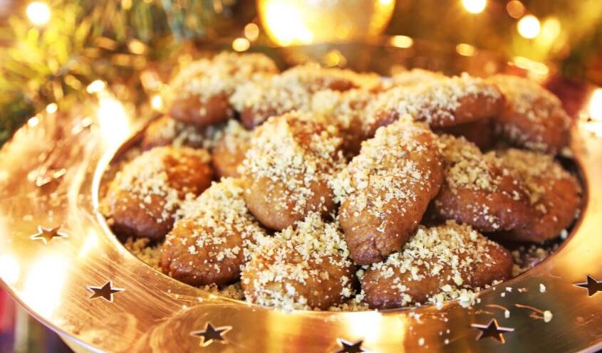 A dish with greek cookies called melomakarona