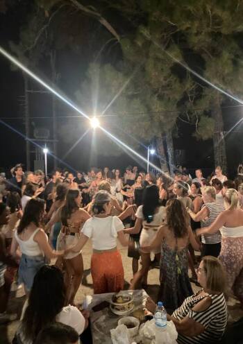 people having fan and dancing at a festival